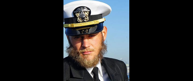 Lt. Paul Johnson with beard.