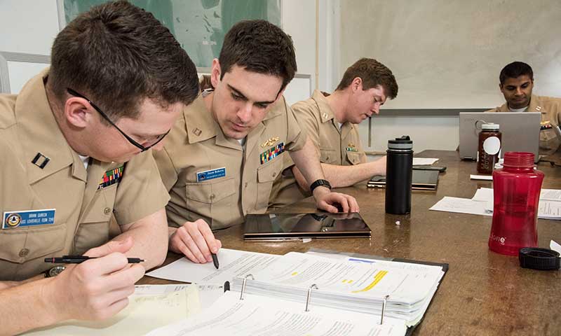 Naval Postgraduate School students working