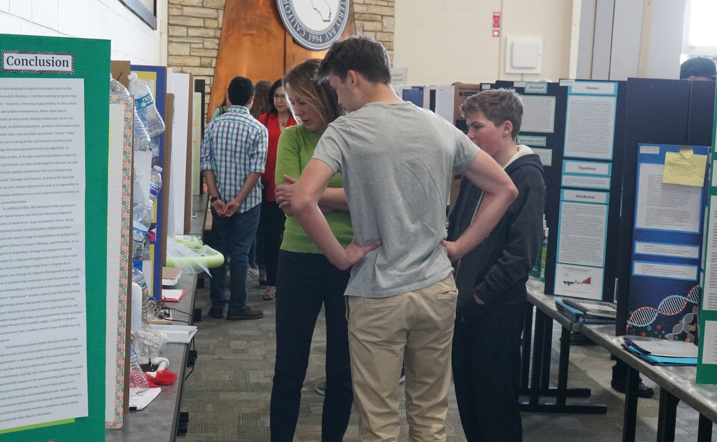 Attendees viewing Science Fair posters