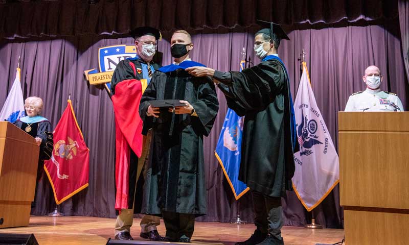 U.S. Marine Corps Maj. Ezra Akin becomes the first student to graduate through the Marine Corps PhD Technical Program